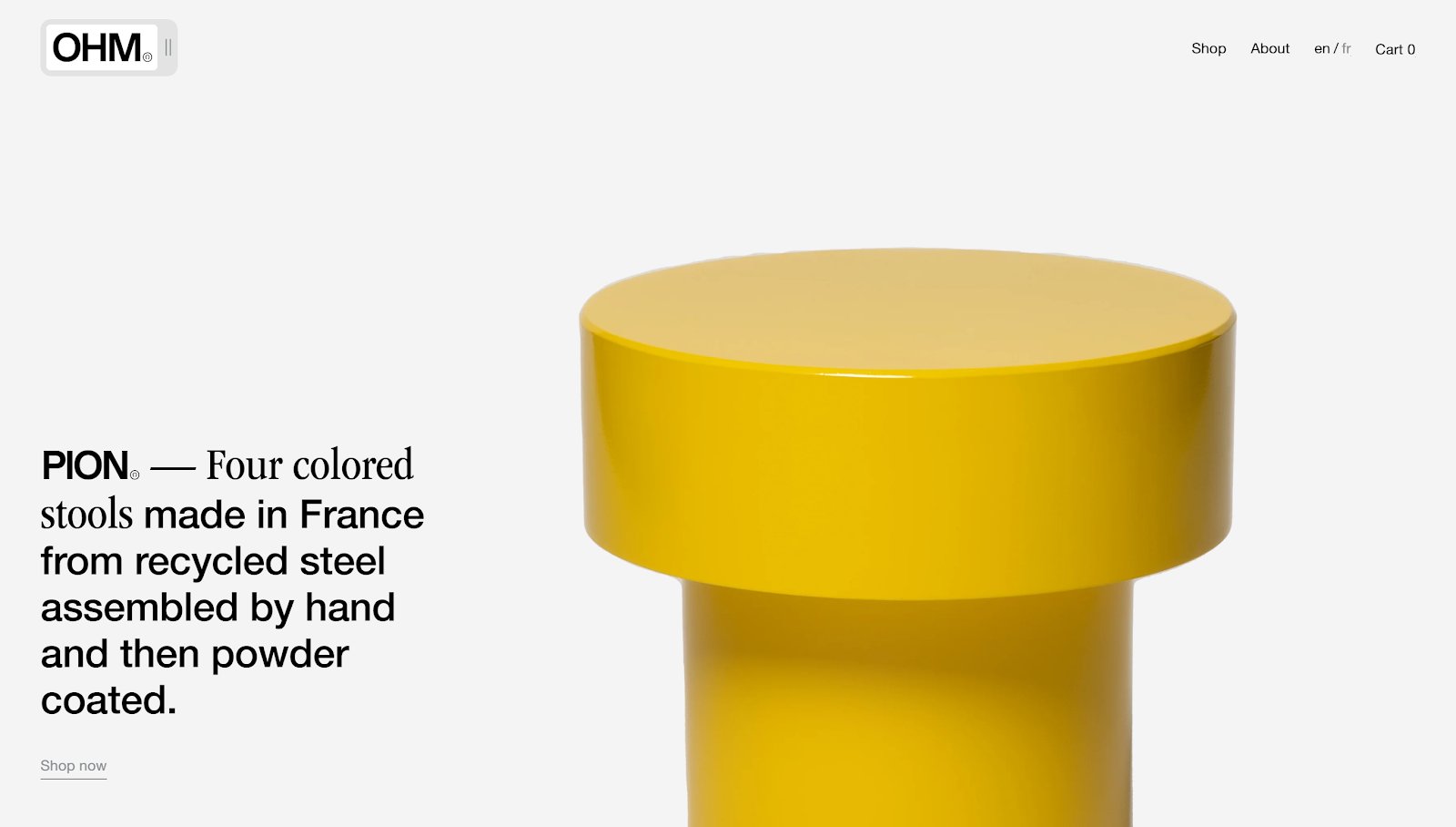 Homepage of OHM studio with simple, yellow geometrical form and typography.